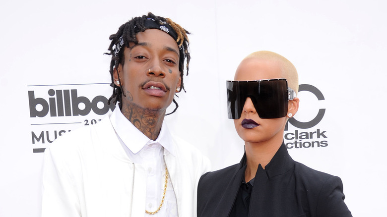 Amber Rose and Wiz Khalifa posing