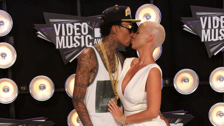 Amber Rose and Wiz Khalifa kissing