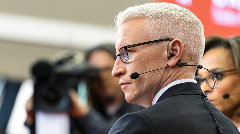 Anderson Cooper with a microphone