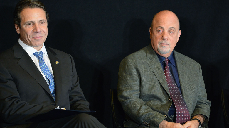 Billy Joel and Andrew Cuomo sharing a stage. 