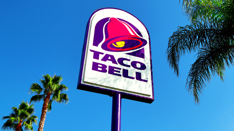 Taco Bell sign with palm trees 