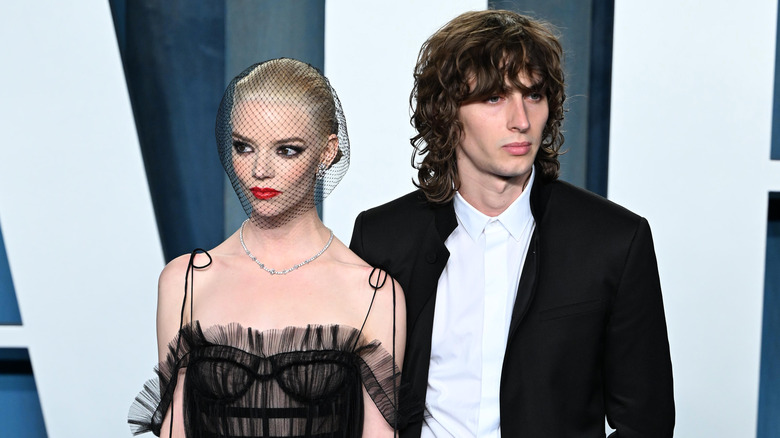 Anya Taylor-Joy and Malcolm McRae at a red carpet