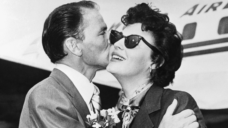 Frank Sinatra kissing Ava Gardner 