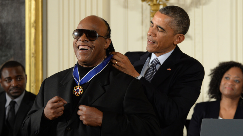 Barack Obama awarding Stevie Wonder the Presidential Medal of Freedom