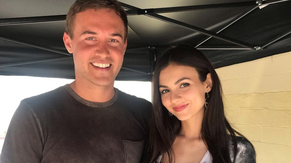 Peter Weber and Victoria Justice smiling