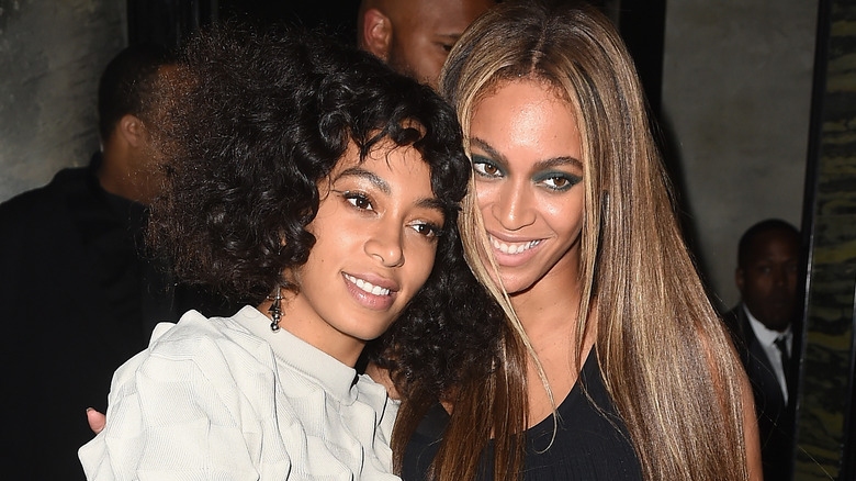 Solange and Beyoncé Knowles smiling