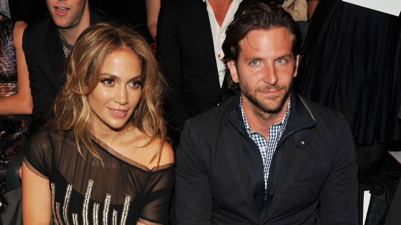 Bradley Cooper and Jennifer Lopez sitting