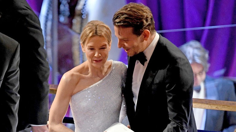 Renée Zellweger and Bradley Cooper talking