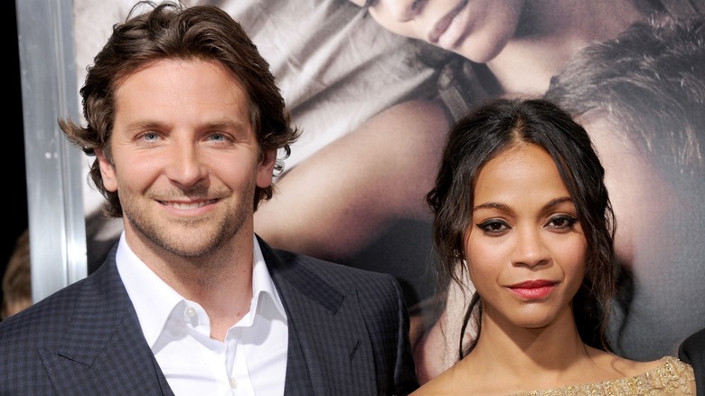 Zoe Saldaña and Bradley Cooper posing