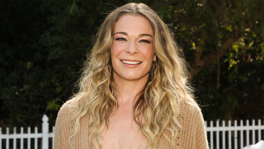 Leann Rimes smiling outdoors