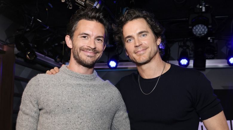 Jonathan Bailey Matt Bomer smiling