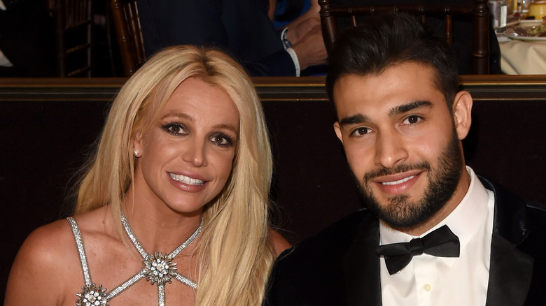 Britney Spears and Sam Asghari, smiling at nice dinner