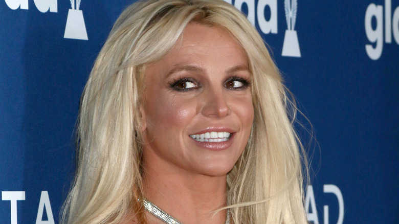 Britney Spears attending an event, smiling