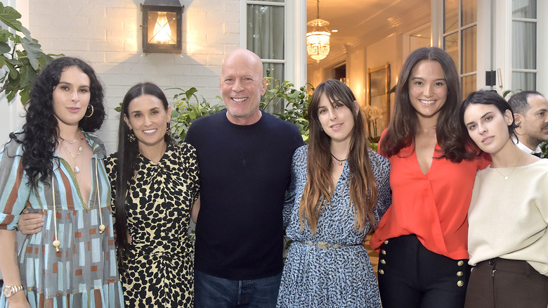Bruce Willis and Demi Moore posing with family