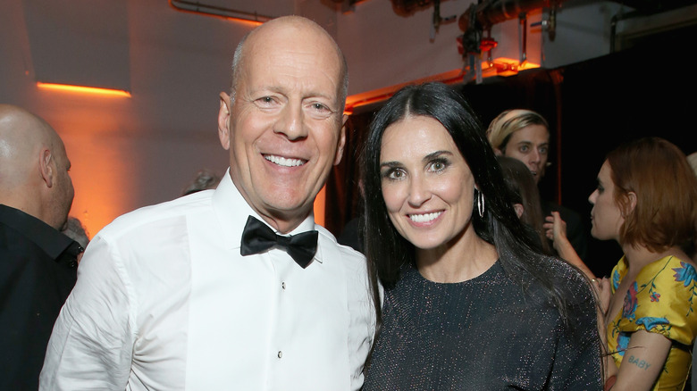 Bruce Willis and Demi Moore smiling