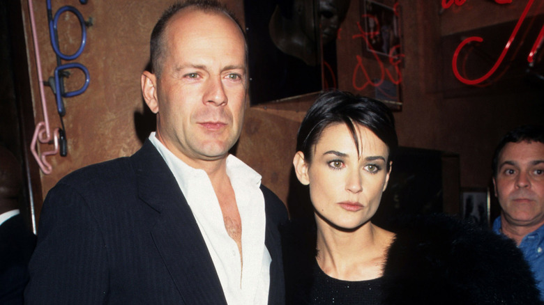 Bruce Willis and Demi Moore pursing their lips
