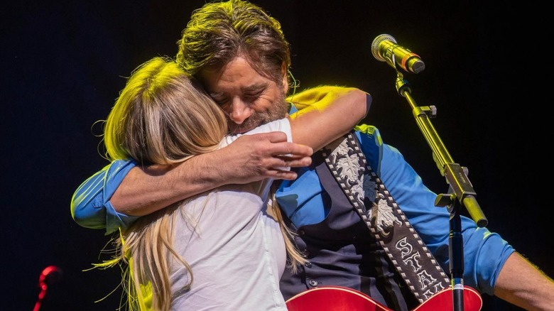 John Stames and Candace Cameron Bure hugging