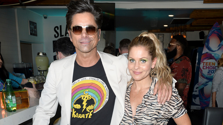 John Stamos and Candace Cameron Bure smiling