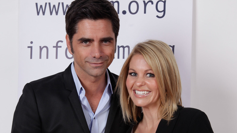 John Stamos and Candace Cameron Bure smiling