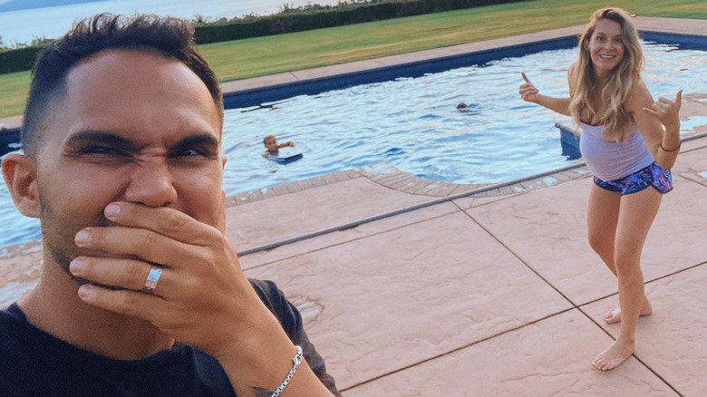 Alexa and Carlos PenaVega by the pool