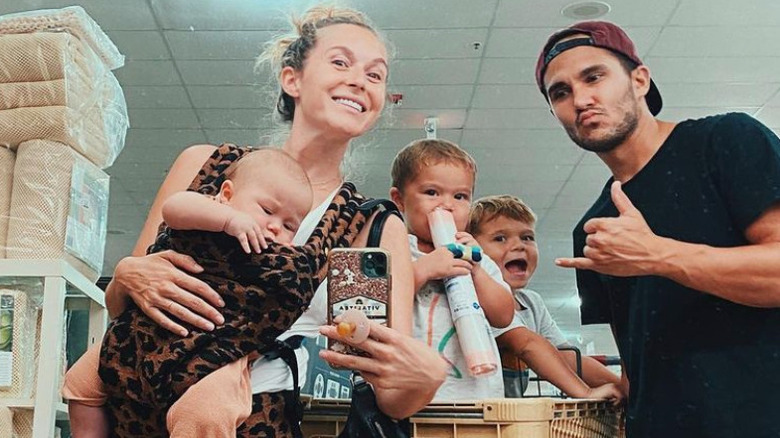 Alexa and Carlos PenaVega taking a selfie with their kids