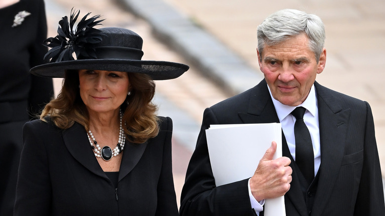 Michael and Carole Middleton staring off into the distance