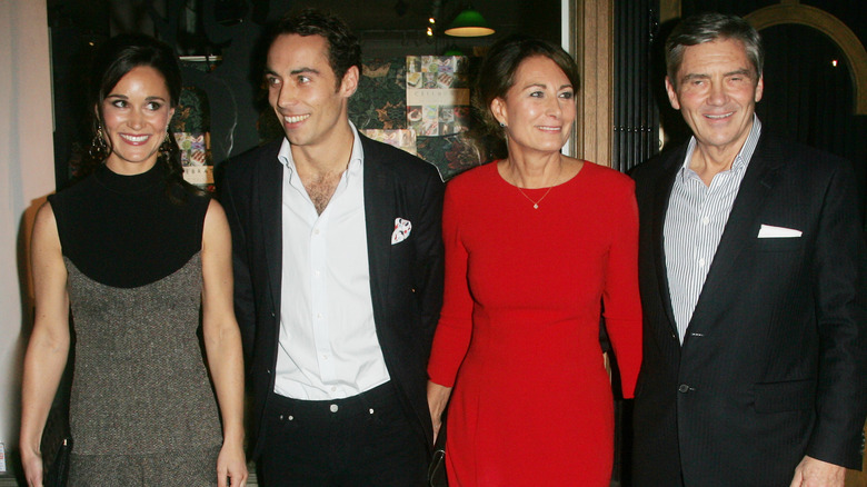 Carole, Michael, James, and Pippa Middleton smiling