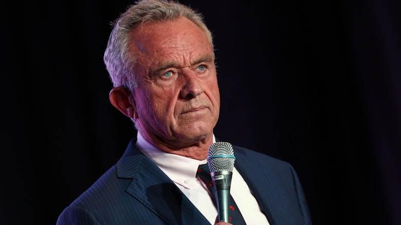 RFK Jr. holding a microphone