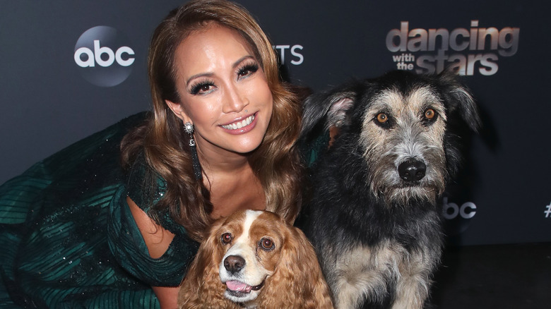 Carrie Ann Inaba posing with dogs