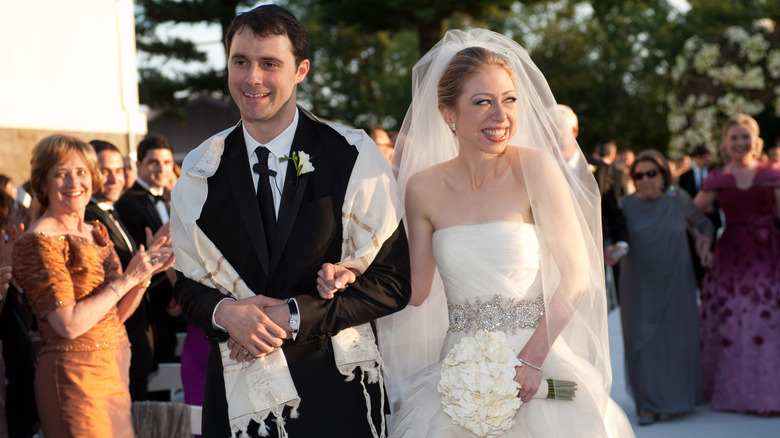 Chelsea Clinton and Marc Mezvinsky smiling wedding