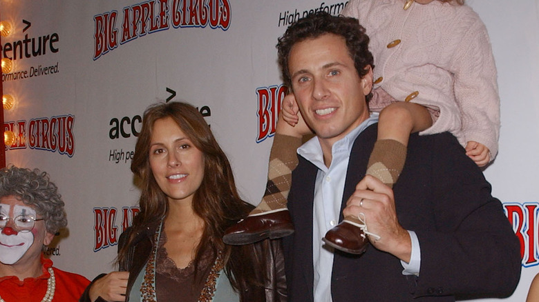 Cristina Greeven Cuomo and Chris Cuomo posing with daughter Bella