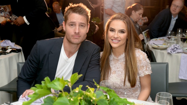 Justin Hartley and Chrishell Stause at a dinner