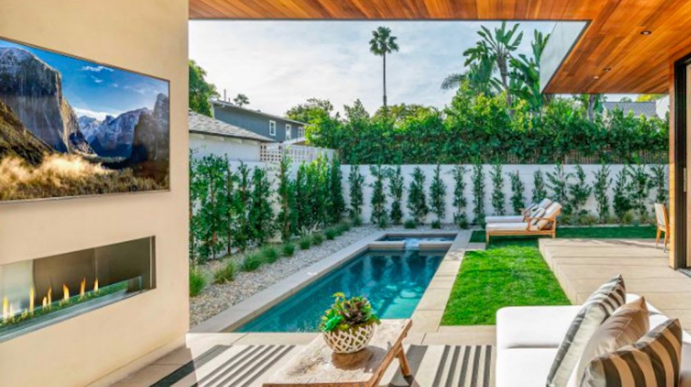 The outdoor fireplace in John Legend and Chrissy Teigen's West Hollywood home