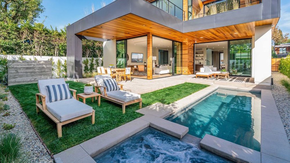 The pool and hot tub outside of John Legend and Chrissy Teigen's West Hollywood home