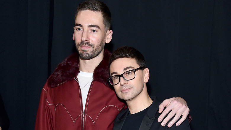 Kyle Smith and Christian Siriano posing together at an event