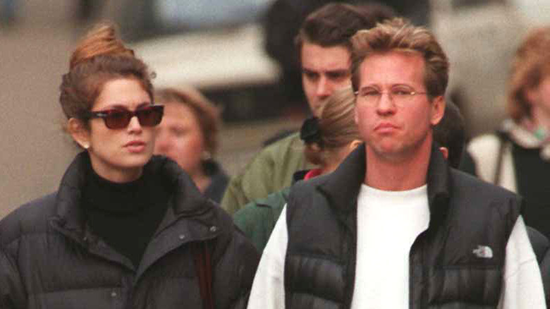 Val Kilmer and Cindy Crawford walking