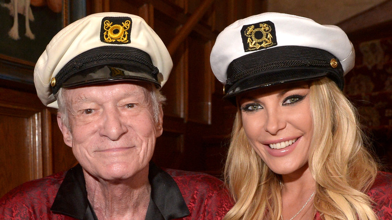 Crystal and Hugh Hefner at an event