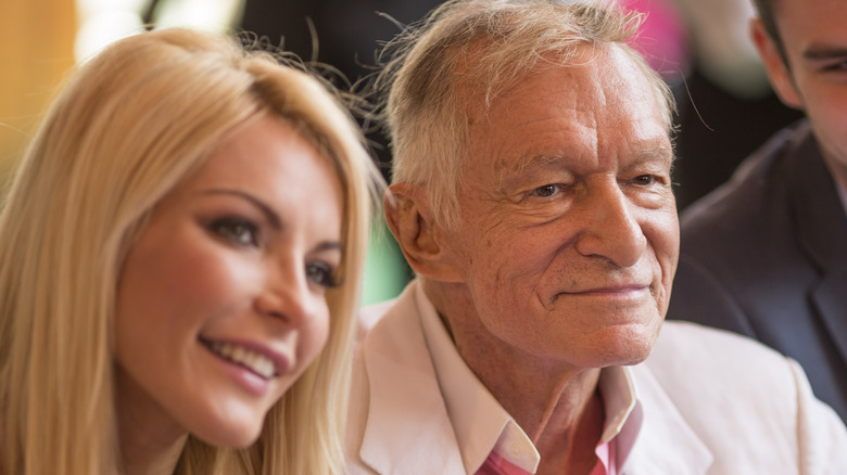 Crystal and Hugh Hefner at an event