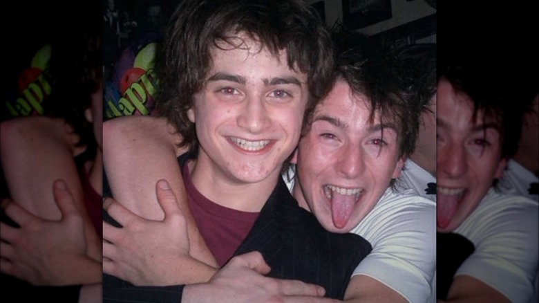 David Holmes hugging Daniel Radcliffe