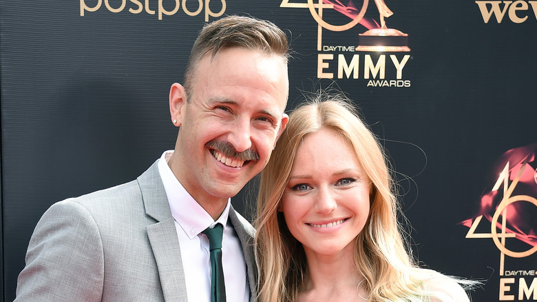 Marci Miller and husband Ryan Matteson pose for a photo together. 