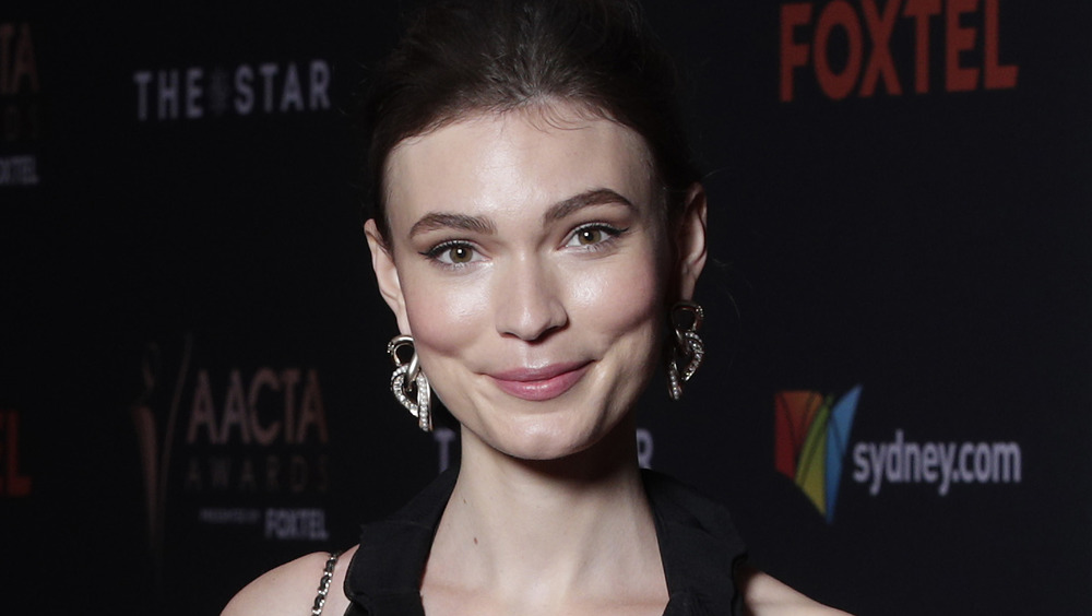 Tilda Cobham-Hervey on the red carpet, smiling