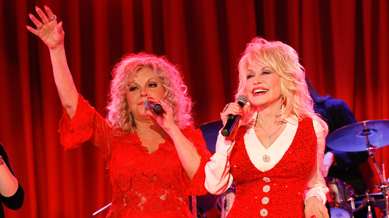 Stella and Dolly Parton performing