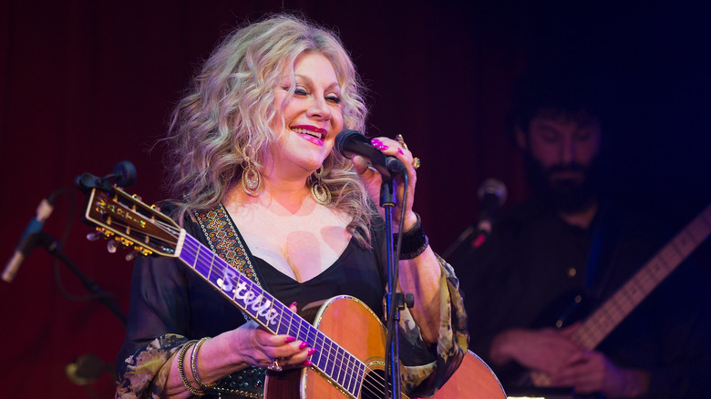 Stella Parton singing onstage