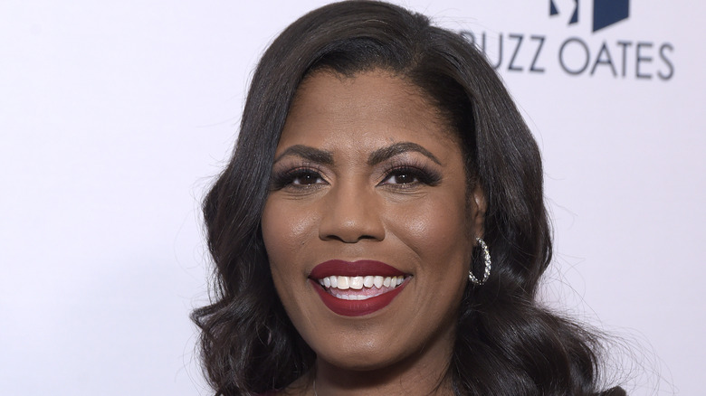 Omarosa smiling at camera