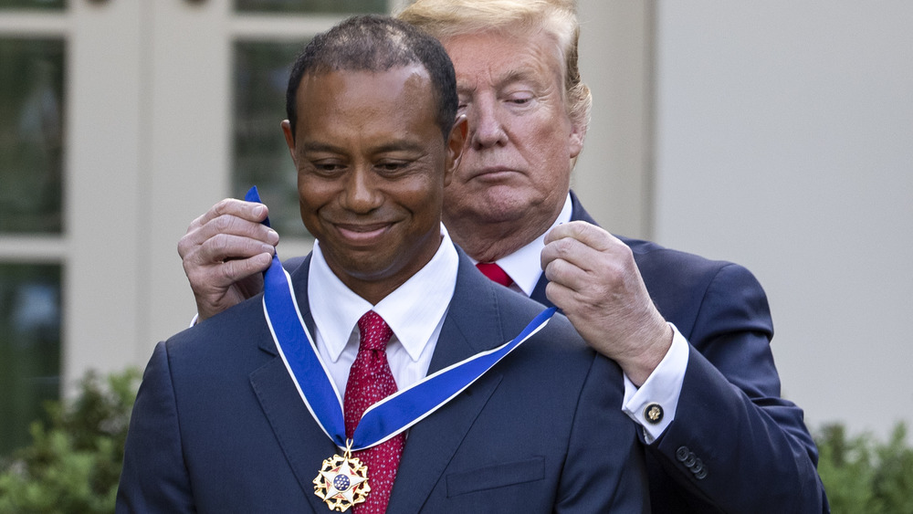 Trump awarding Tiger Woods medal