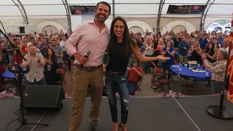 Lauren Boebert and Donald Trump Jr. posing at Freedom Fest