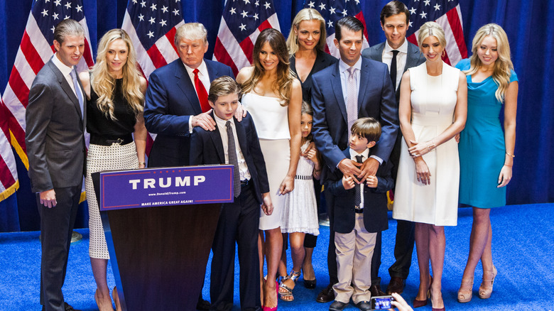 Donald Trump posing with his family 