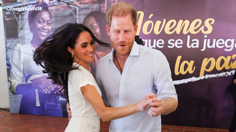 Magan Markle and Prince Harry dancing