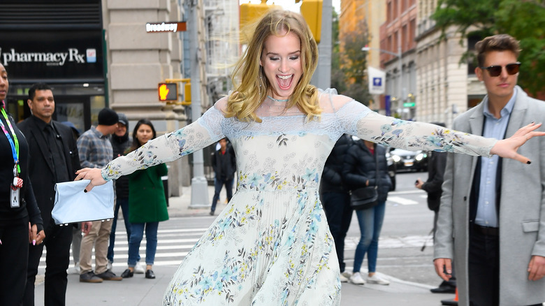 Elizabeth Lail laughing on the street