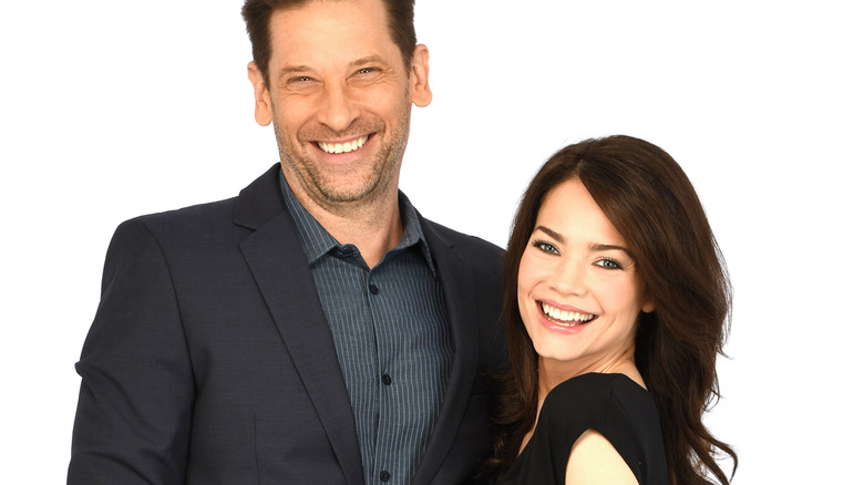 Roger Howarth Rebecca Herbst smiling